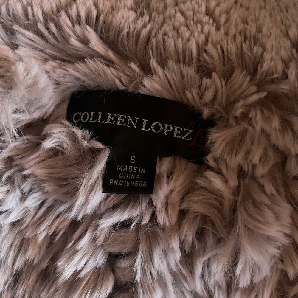 A beautiful soft gray woman’s coat